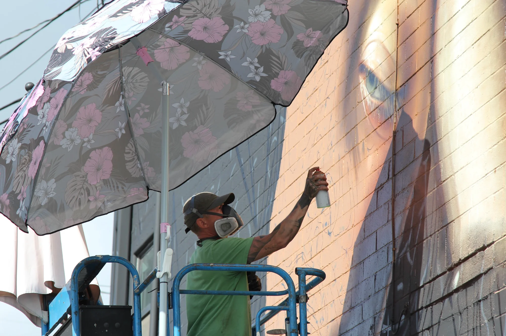 JEKS on lift with umbrella